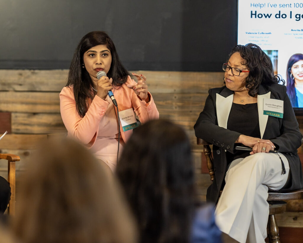 Woman over 40 speaking on panel at SecondActWomen event.